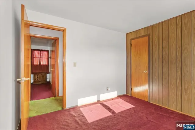 a view of a house with backyard and porch