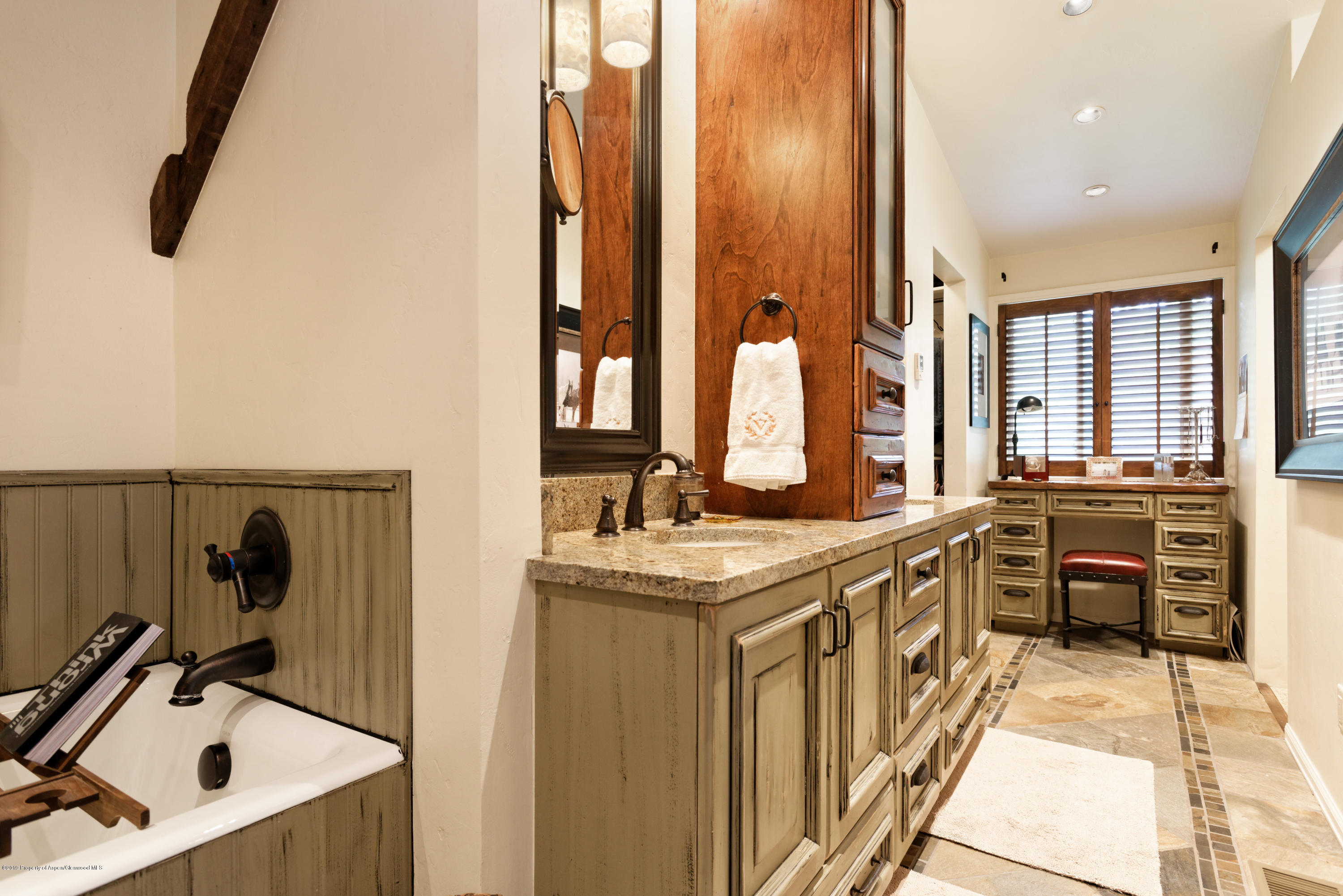 195 Riverside Drive Basalt, CO 81621 - Photo 13 of 38 a kitchen with stainless steel appliances a sink and cabinets