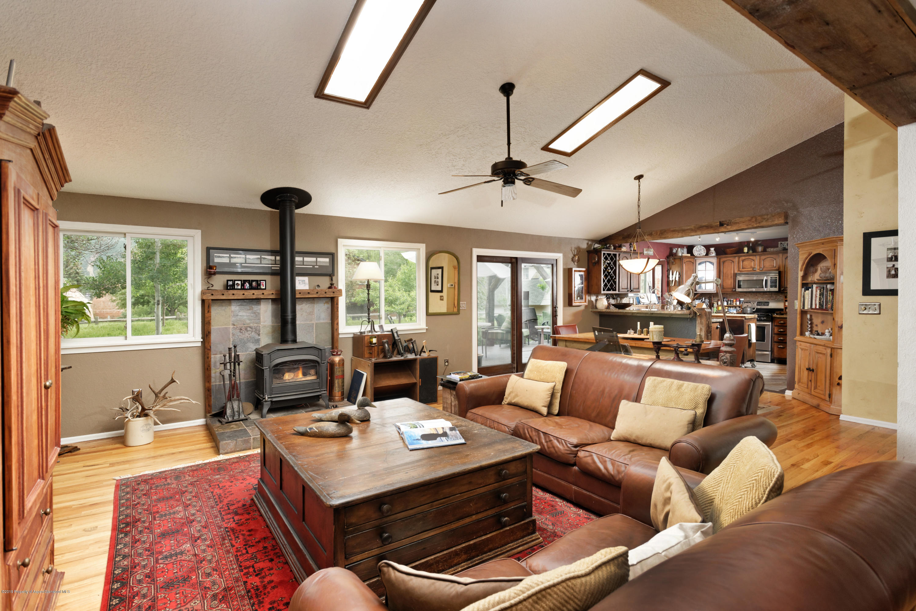 195 Riverside Drive Basalt, CO 81621 - Photo 4 of 38 a living room with furniture and a large window