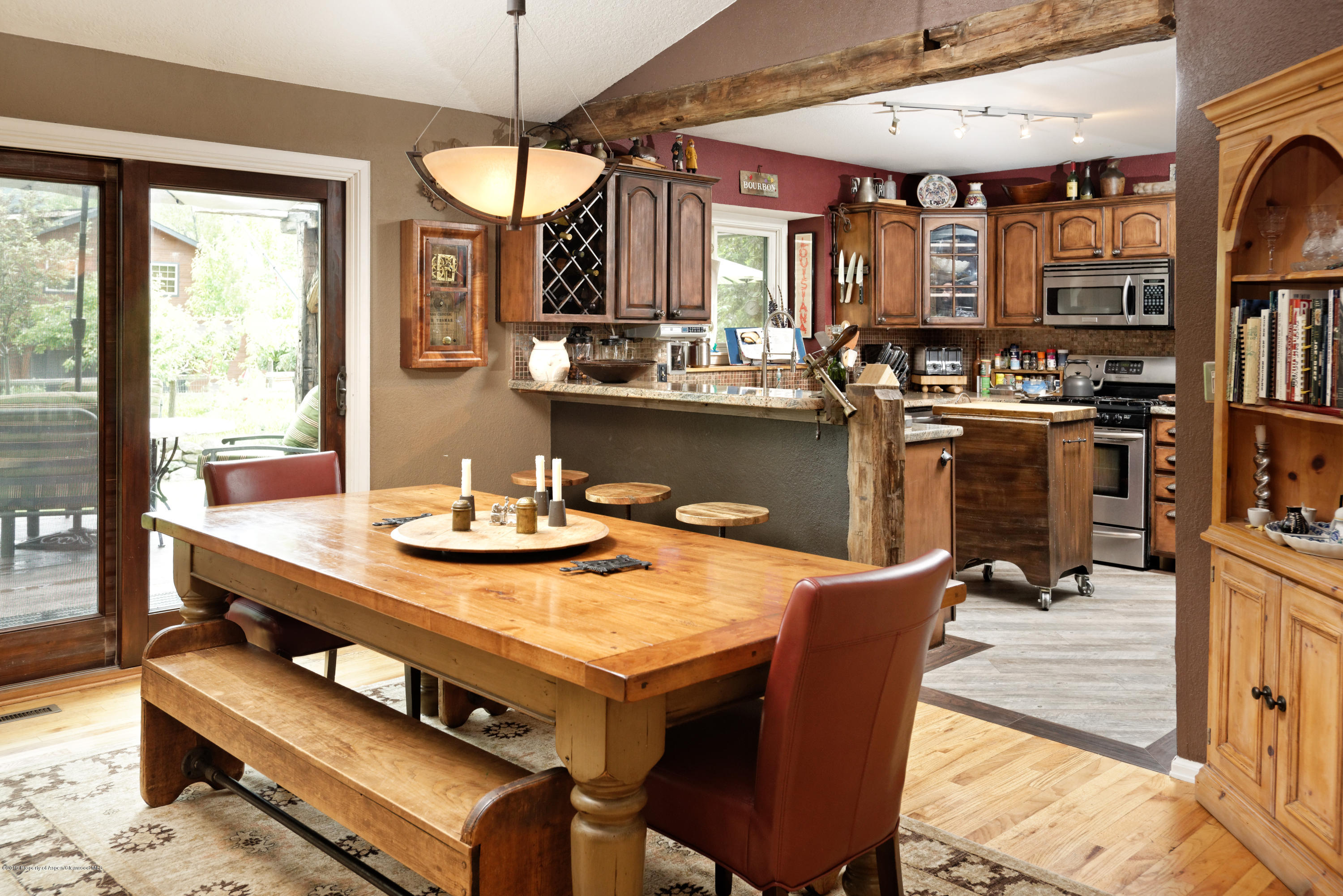 195 Riverside Drive Basalt, CO 81621 - Photo 8 of 38 a dining room with furniture and window