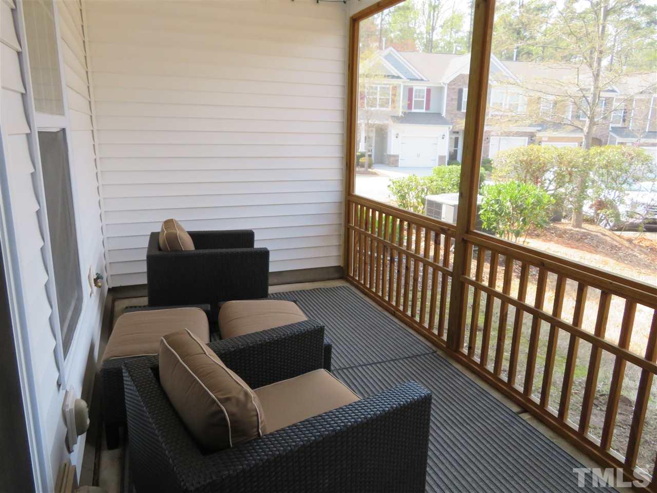 2442 Memory Ridge Drive Raleigh, NC 27606 - Photo 23 of 23 a balcony with wooden floor and outdoor seating