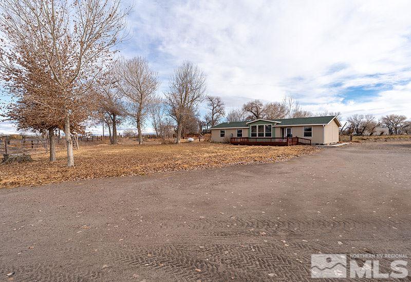 3745 Schindler Road Fallon, NV 89406 - Photo 2 of 16 a view of a town with large trees