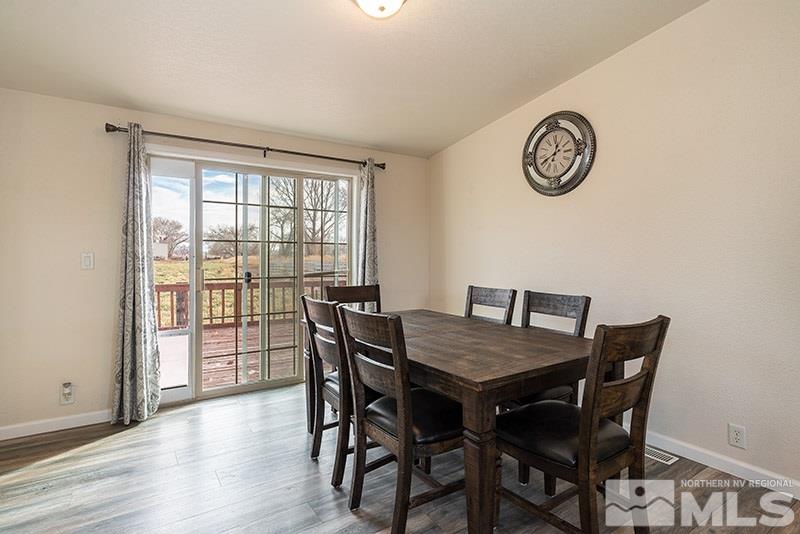 3745 Schindler Road Fallon, NV 89406 - Photo 3 of 16 a view of a dining room with furniture window and wooden floor