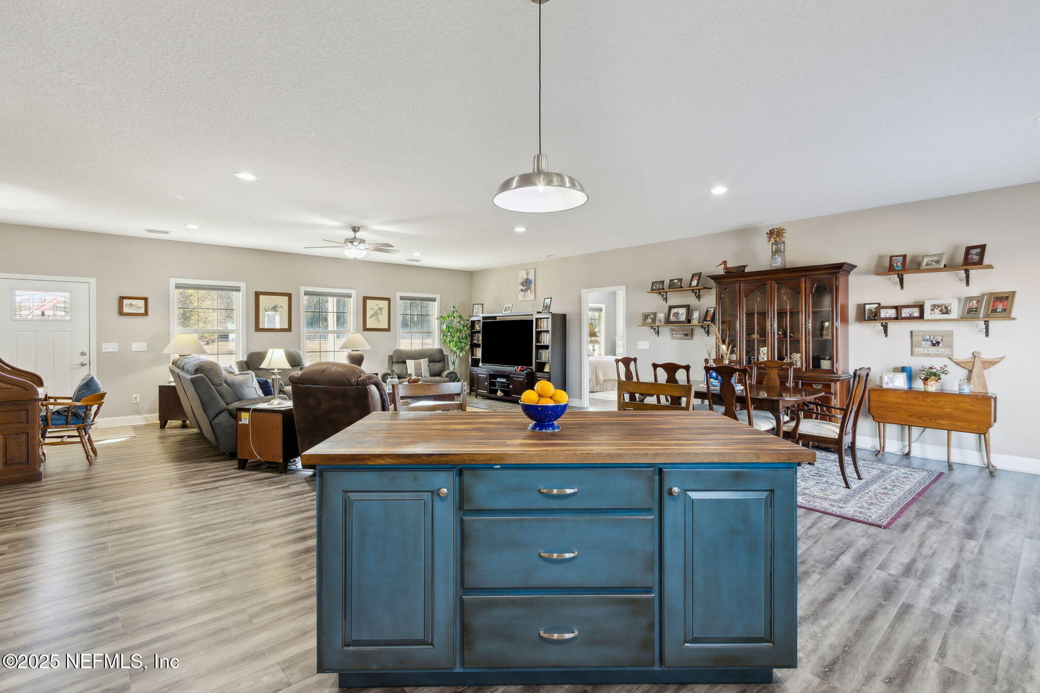 3303 Henry Lee Road Hilliard, FL 32046 - Photo 17 of 35 a living room with furniture and wooden floor