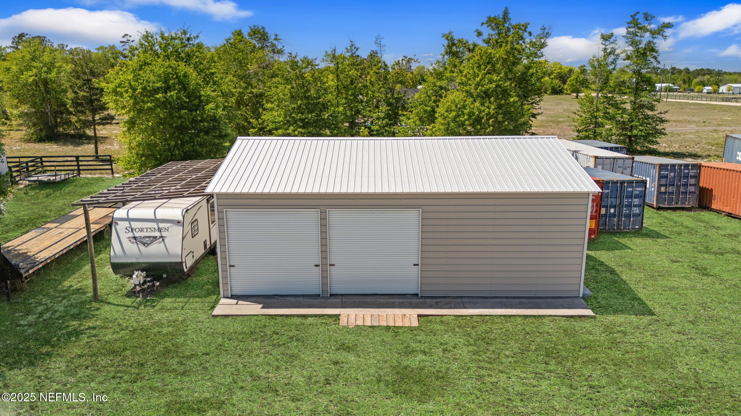 3303 Henry Lee Road Hilliard, FL 32046 - Photo 4 of 35 a view of a backyard