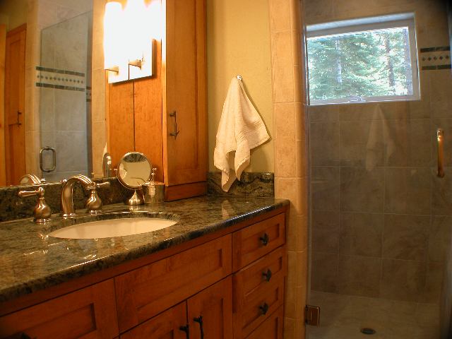 1116 Martis Landing Truckee, CA 96161 - Photo 6 of 7 a bathroom with a granite countertop sink and a mirror