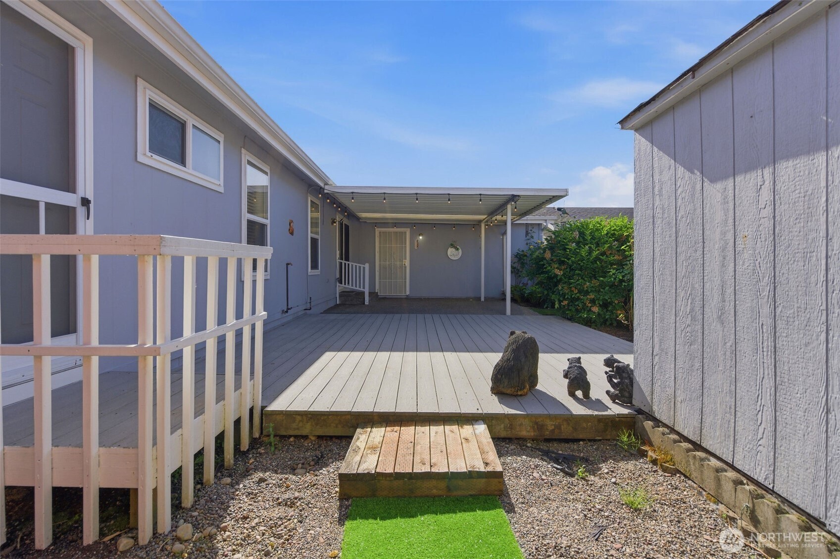24036 222nd Avenue Southeast Maple Valley, WA 98038 - Photo 24 of 37 a house view with a garden space