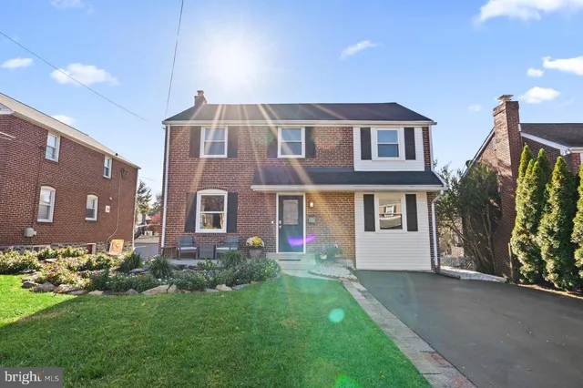 a front view of house with yard