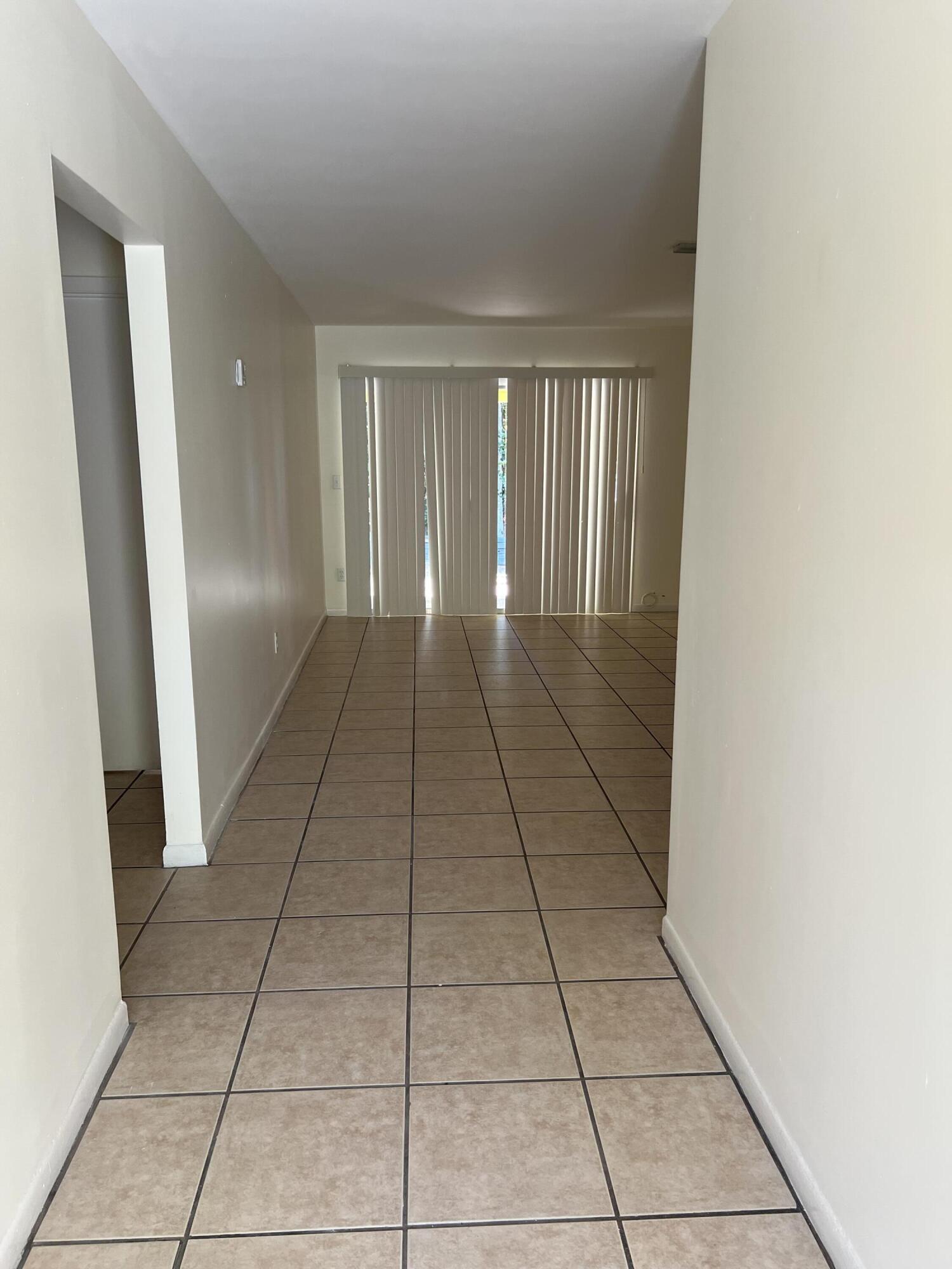 17345 Bush Road, Unit E Jupiter, FL 33458 - Photo 2 of 15 IMG_6584