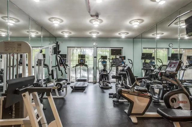 a view of a room with gym equipment