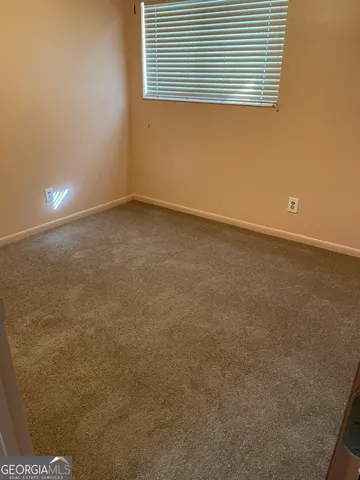 an empty room with a window