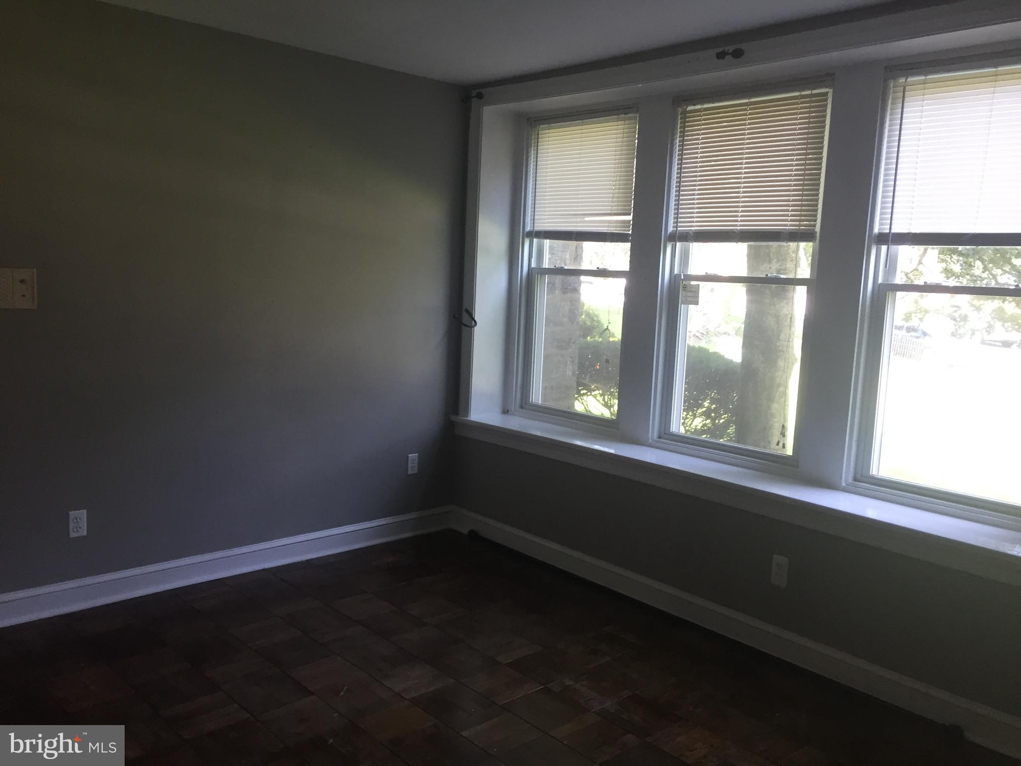 6357 Lancaster Avenue Philadelphia, PA 19151 - Photo 12 of 27 an empty room with a window