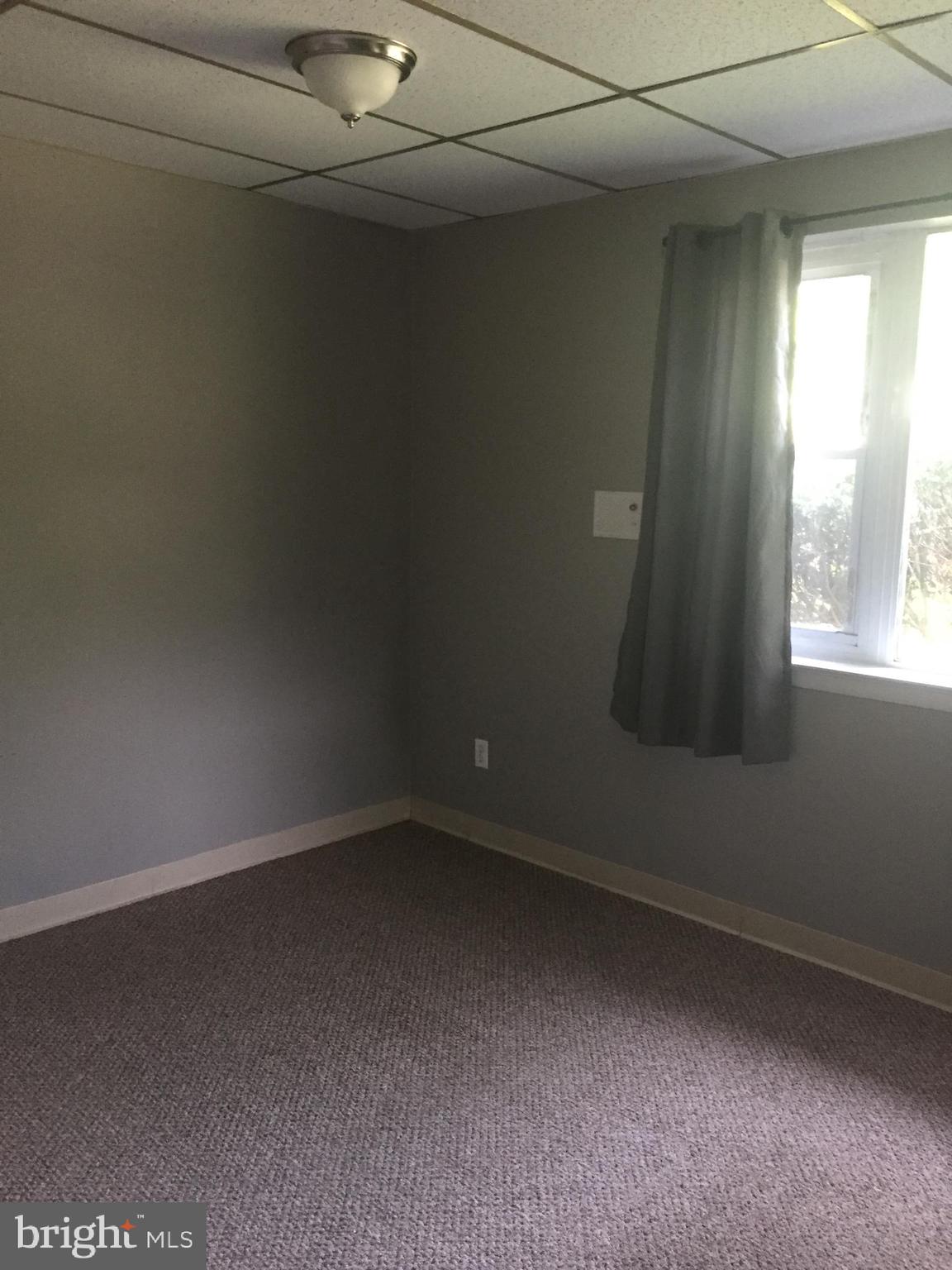 6357 Lancaster Avenue Philadelphia, PA 19151 - Photo 18 of 27 a view of an empty room and window