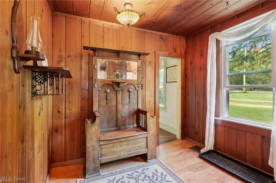10571 Mayfield Road Chesterland, OH 44026 - Photo 5 of 39 Inviting side entry with warm natural woodwork.