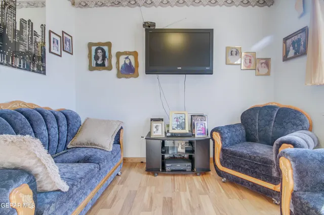 a bedroom with a bed and a more cabinets