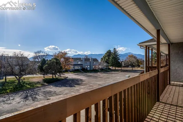 a view of a porch and a yard