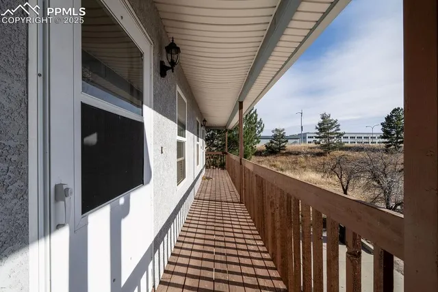 a view of balcony with seating space