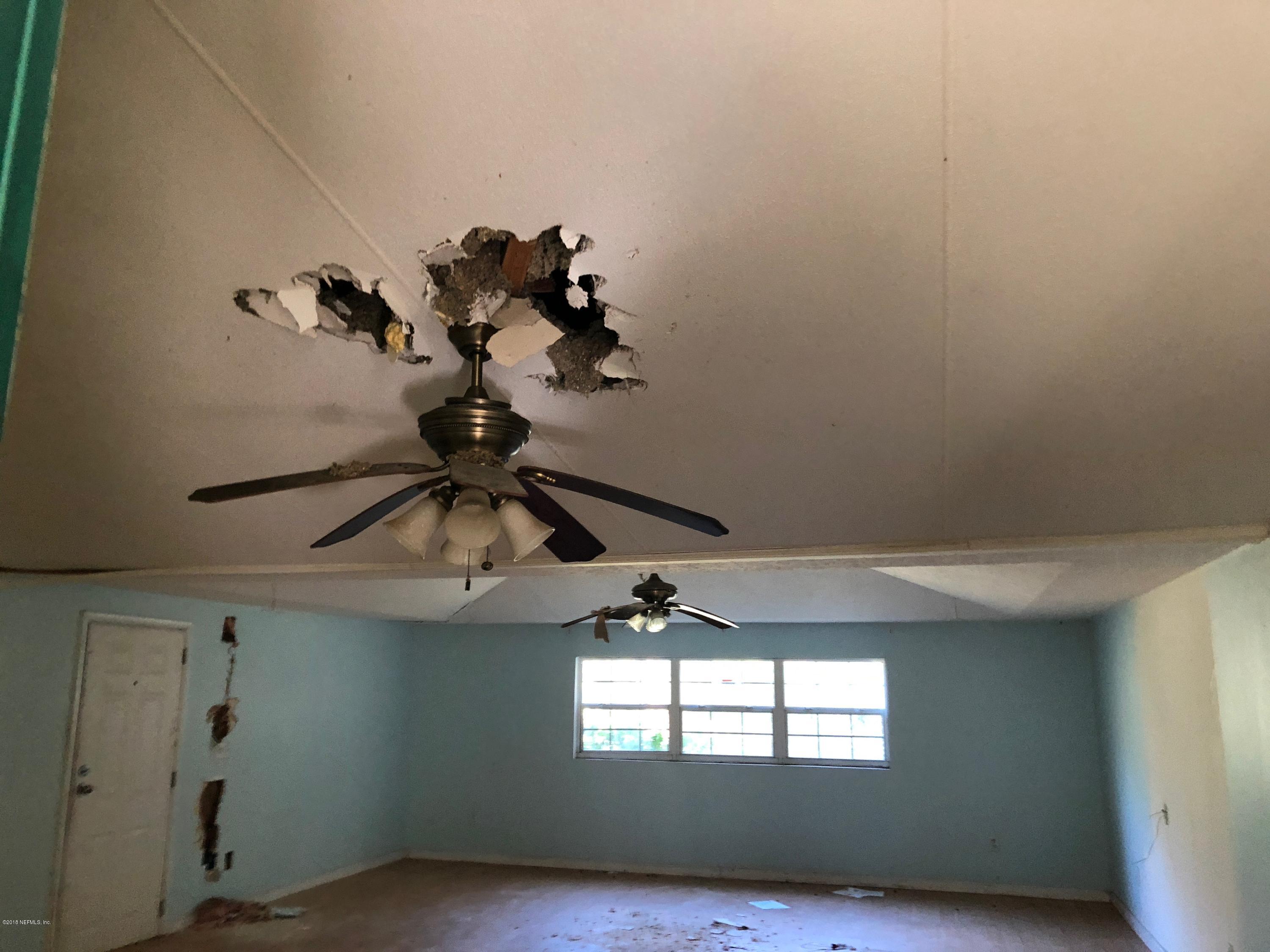 7140 Northeast 192 Place Citra, FL 32113 - Photo 5 of 10 a view of a window in an empty room