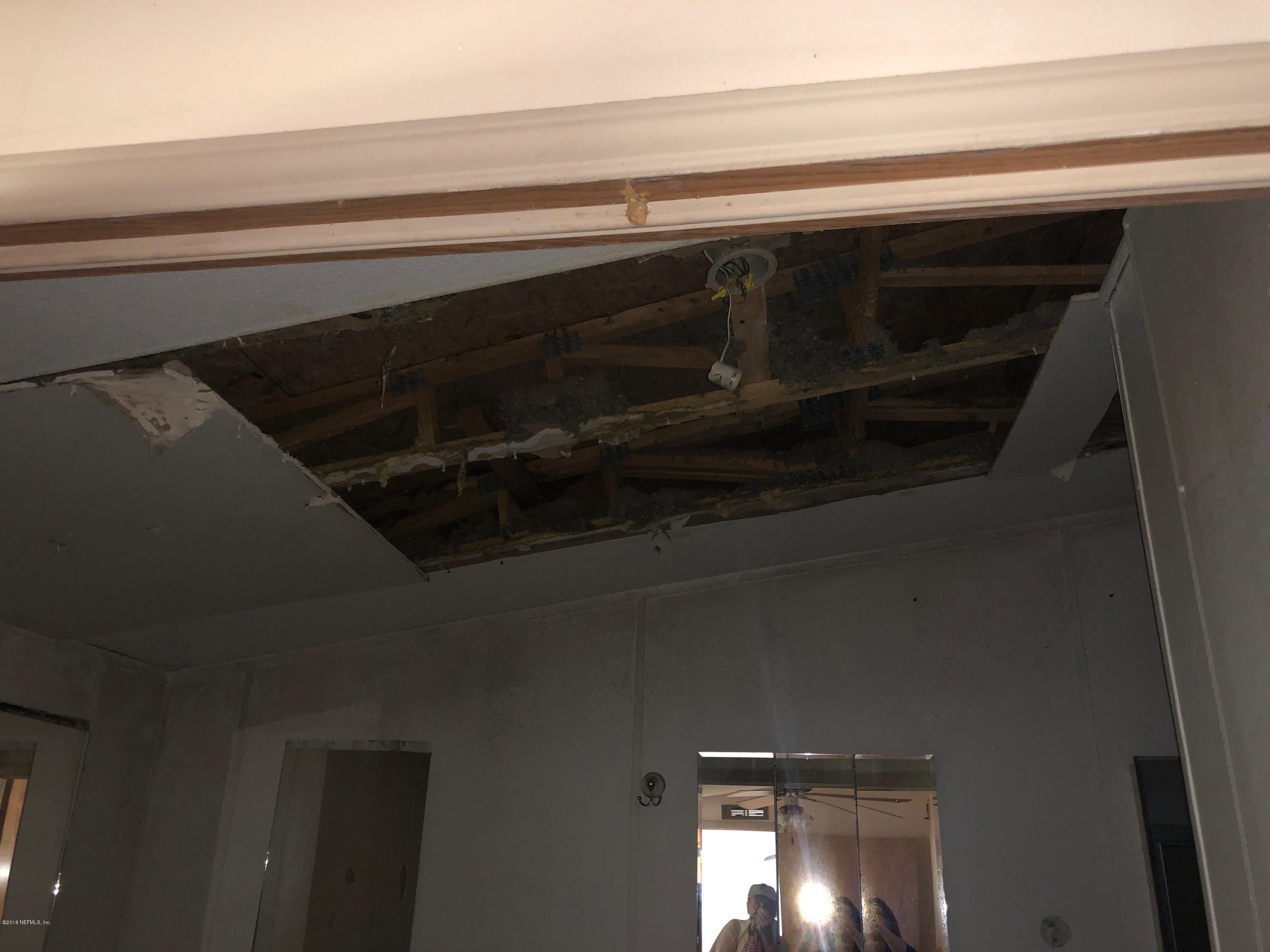 7140 Northeast 192 Place Citra, FL 32113 - Photo 6 of 10 a close view of utility room