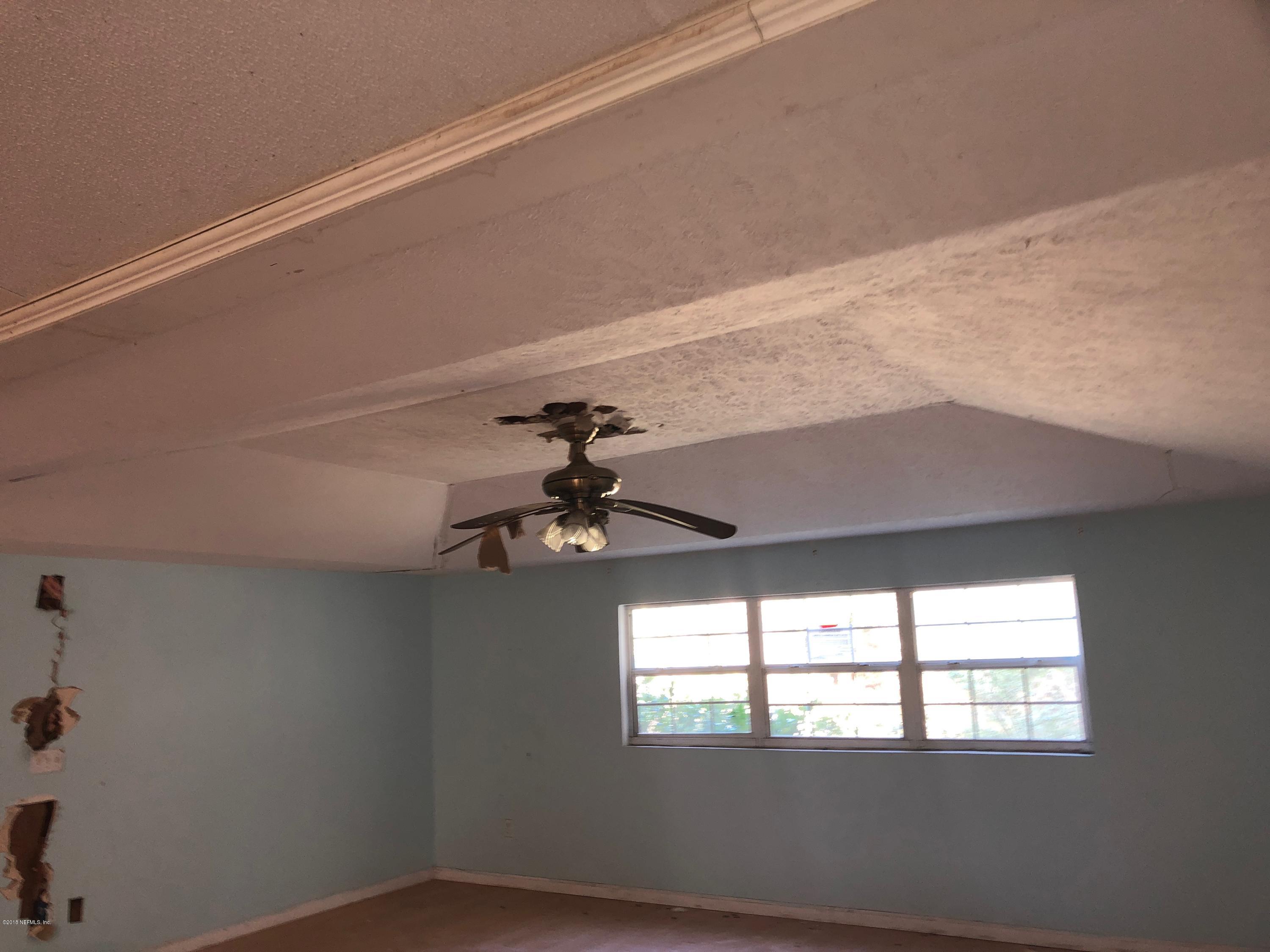 7140 Northeast 192 Place Citra, FL 32113 - Photo 7 of 10 a view of an empty room with a window