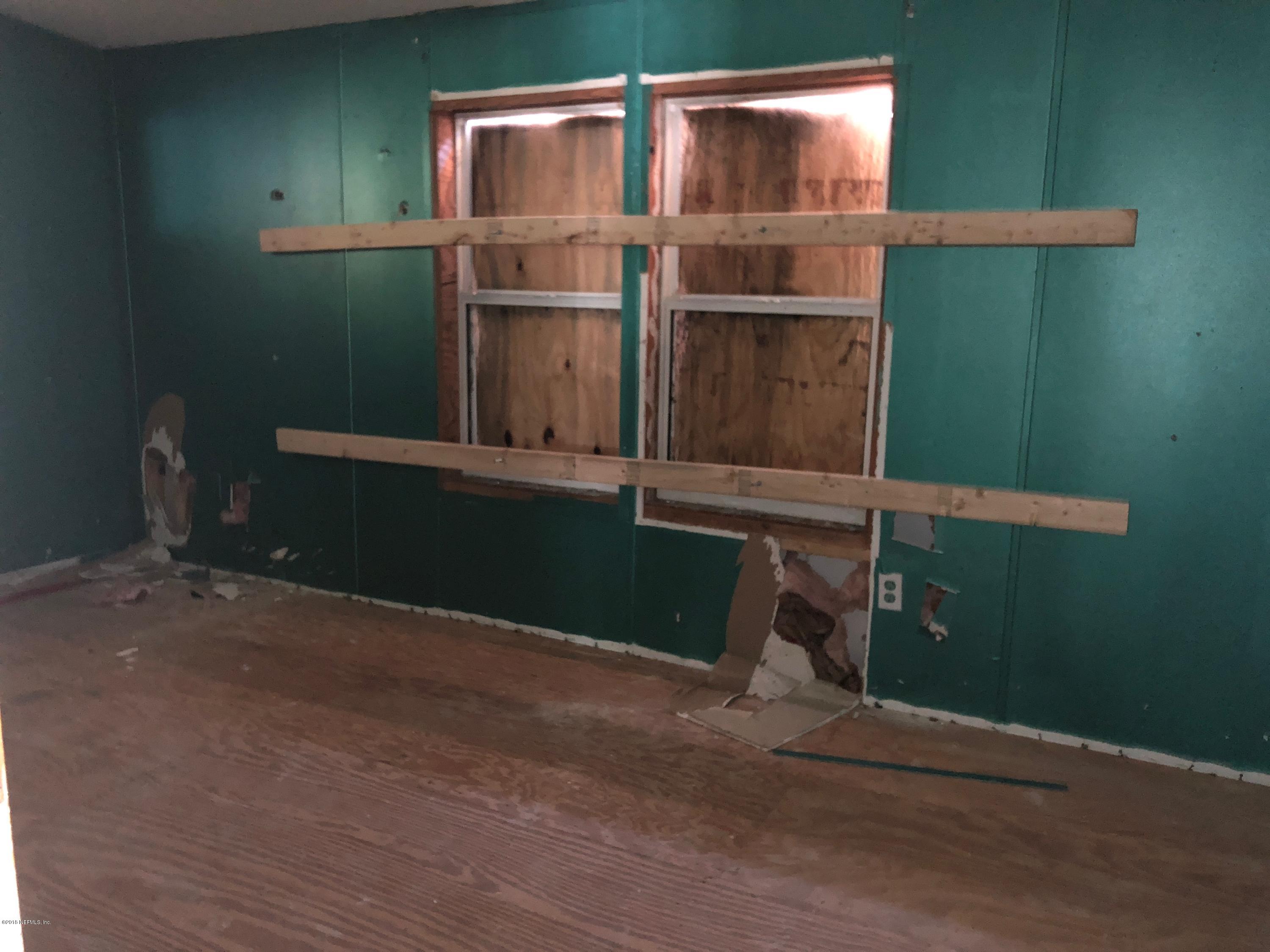 7140 Northeast 192 Place Citra, FL 32113 - Photo 8 of 10 a view of front door