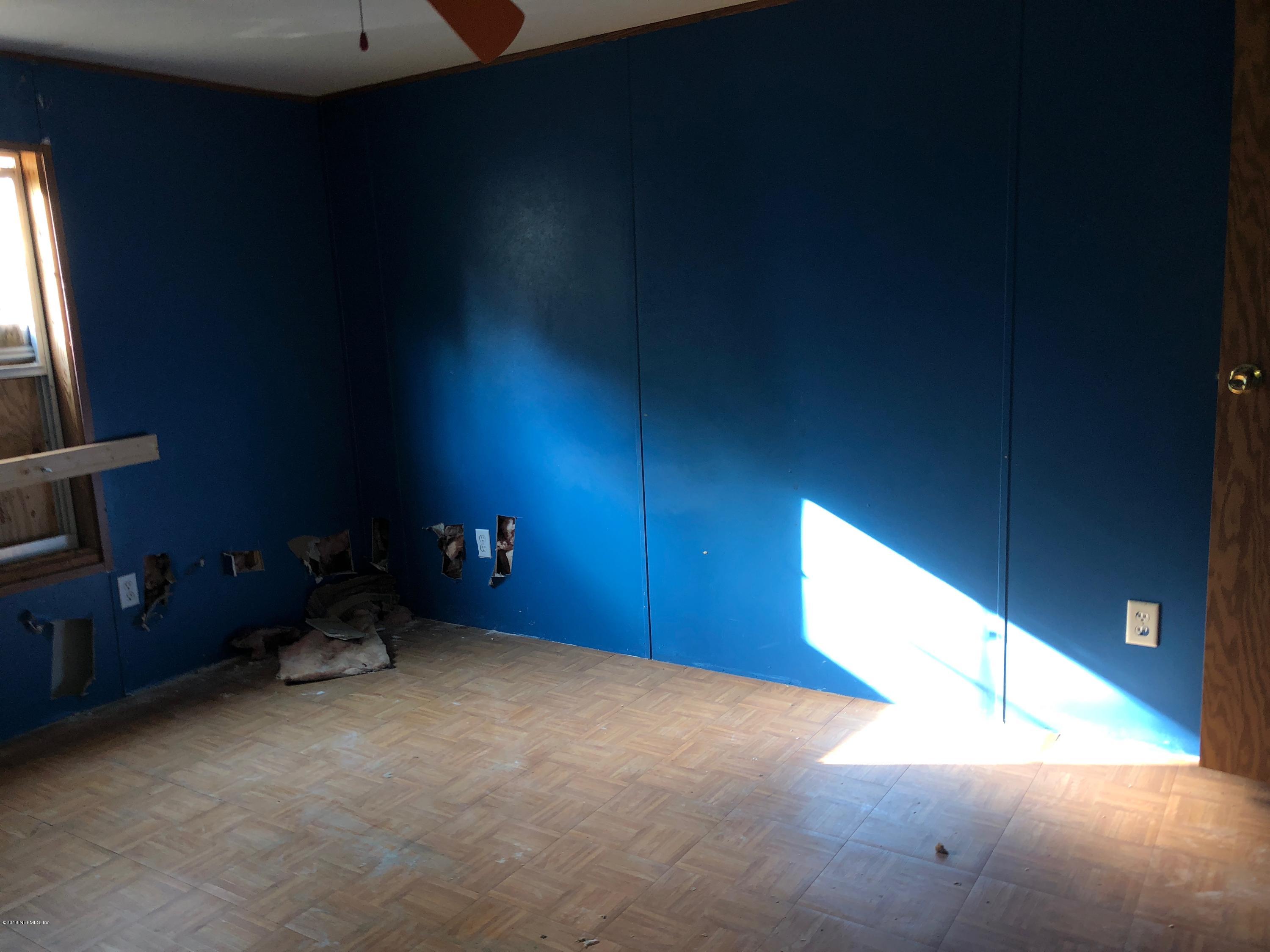 7140 Northeast 192 Place Citra, FL 32113 - Photo 9 of 10 a view of an empty room