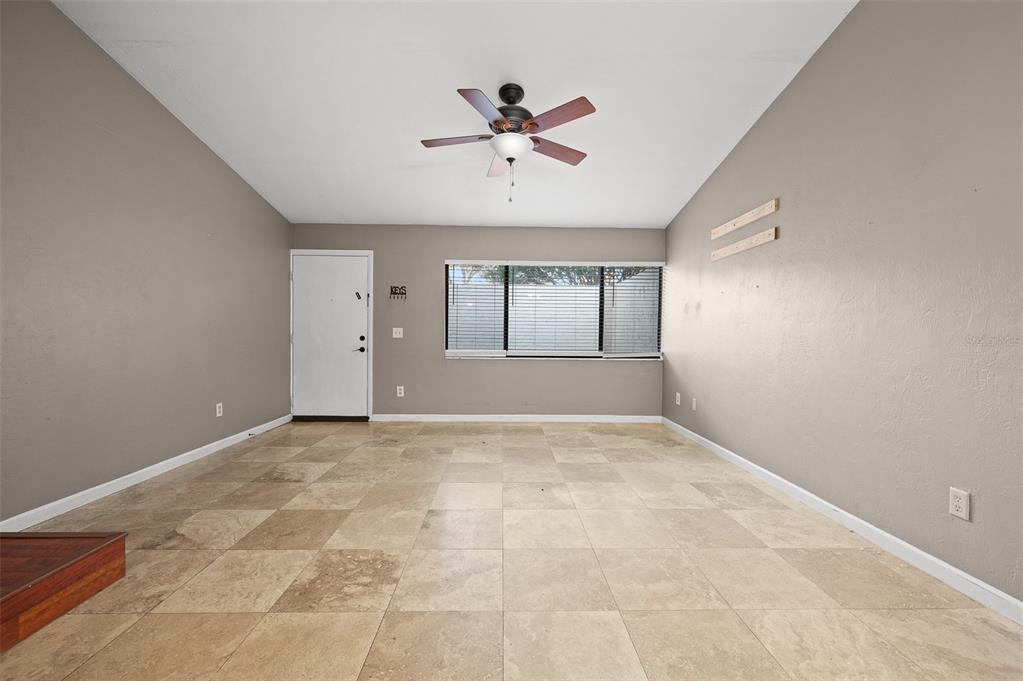 2508 Southwest 35th Place, Unit 51 Gainesville, FL 32608 - Photo 8 of 20 a view of an empty room with a window