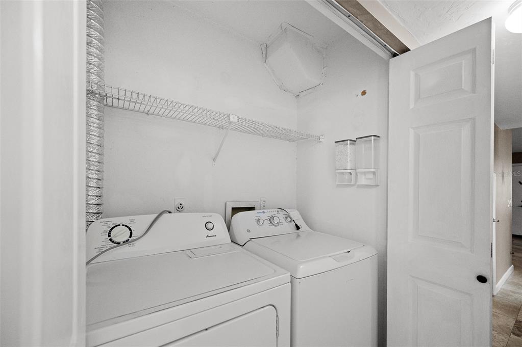 2508 Southwest 35th Place, Unit 151 Gainesville, FL 32608 - Photo 9 of 19 a utility room with dryer and washer