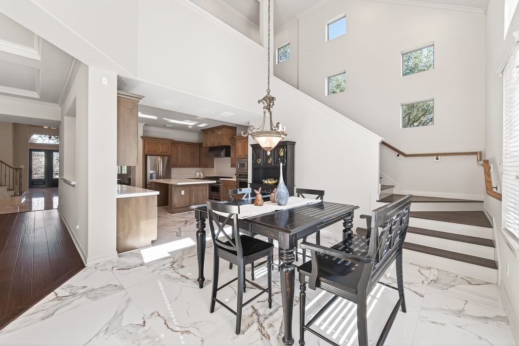 8115 Salta Verde Point Katy, TX 77494 - Photo 25 of 50 a view of a dining room with furniture