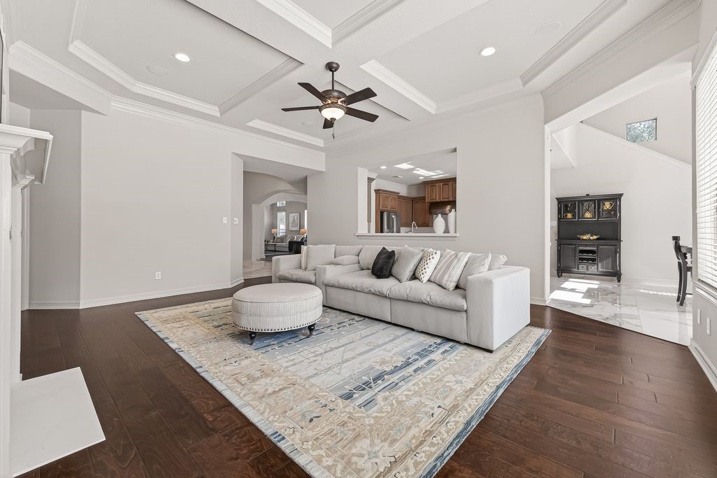 8115 Salta Verde Point Katy, TX 77494 - Photo 27 of 50 a living room with furniture and a wooden floor