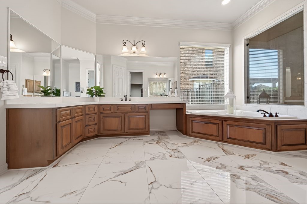 8115 Salta Verde Point Katy, TX 77494 - Photo 30 of 50 a large bathroom with a large tub and sink