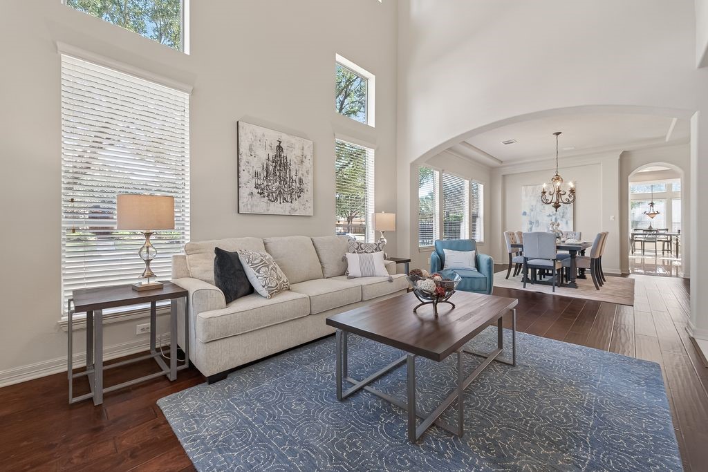 8115 Salta Verde Point Katy, TX 77494 - Photo 3 of 50 a living room with furniture wooden floor and a large window