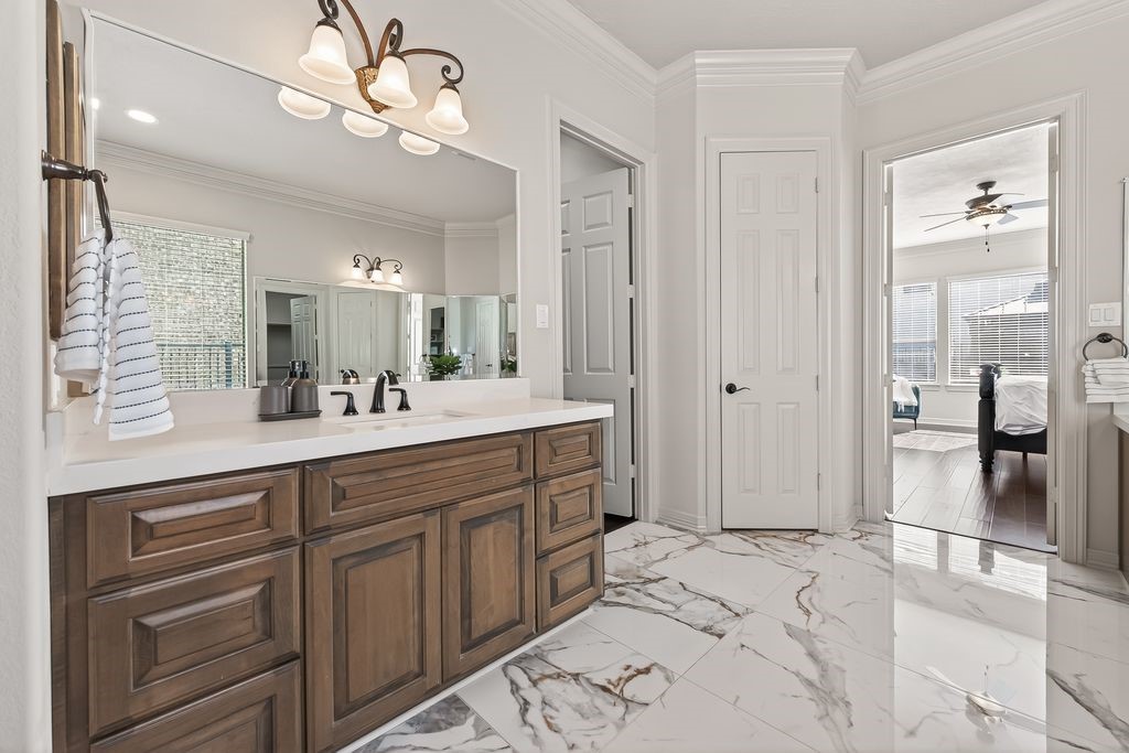 8115 Salta Verde Point Katy, TX 77494 - Photo 32 of 50 a spacious bathroom with a shower a sink and a mirror
