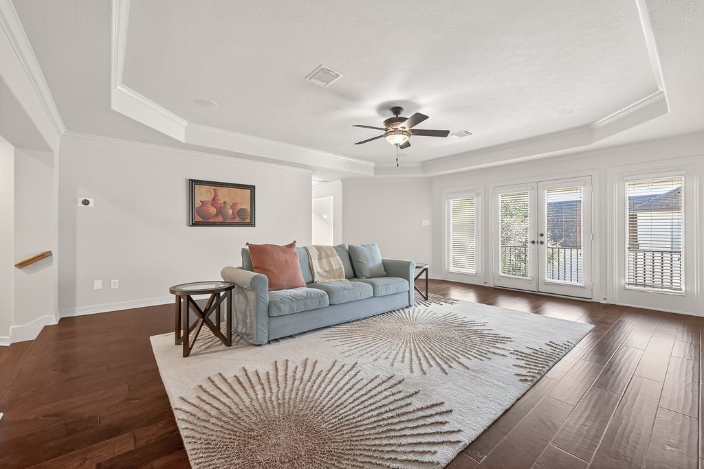 8115 Salta Verde Point Katy, TX 77494 - Photo 35 of 50 a living room with furniture and wooden floor