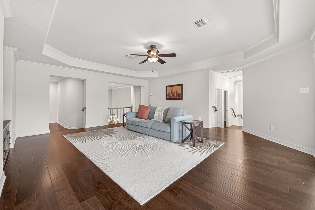 8115 Salta Verde Point Katy, TX 77494 - Photo 36 of 50 a living room with furniture and a table