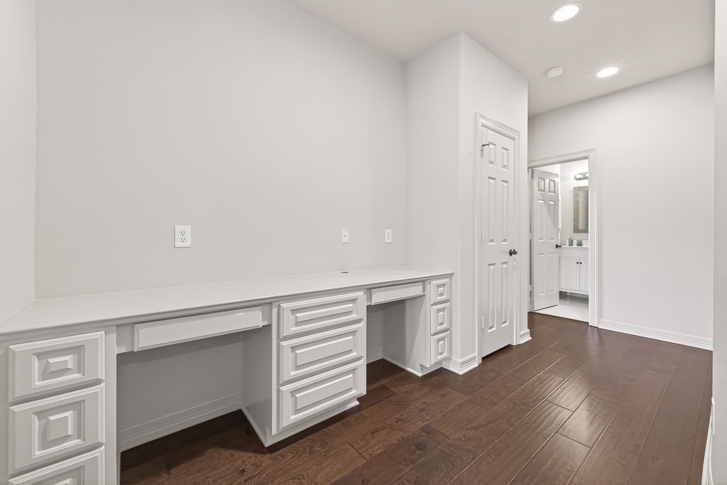 8115 Salta Verde Point Katy, TX 77494 - Photo 37 of 50 a view of an empty room with wooden floor and closet