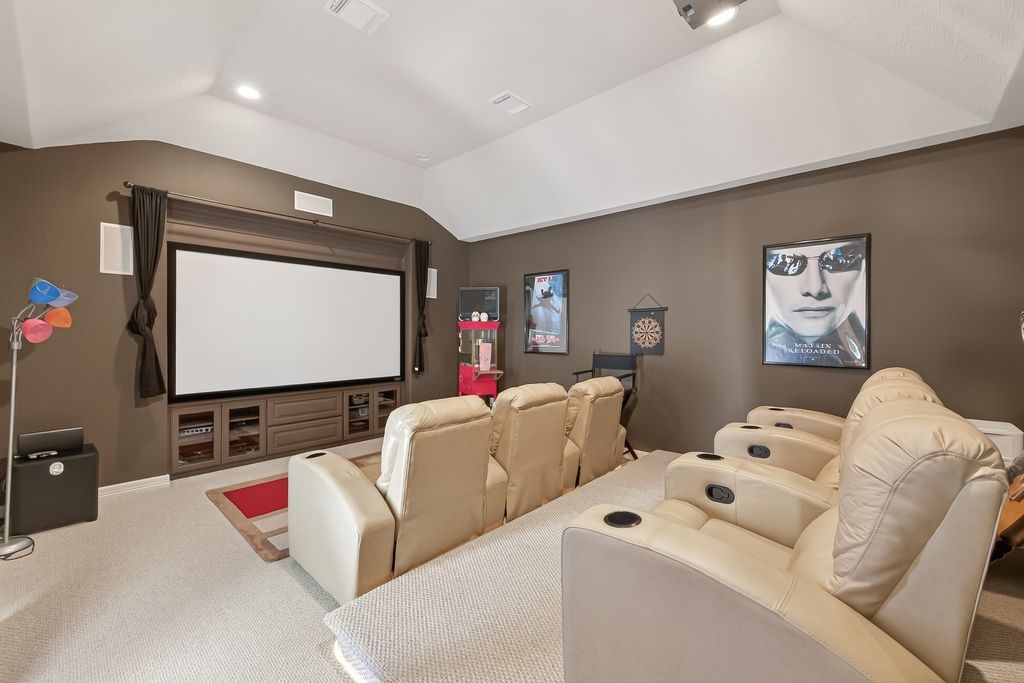 8115 Salta Verde Point Katy, TX 77494 - Photo 38 of 50 a living room with furniture and a flat screen tv