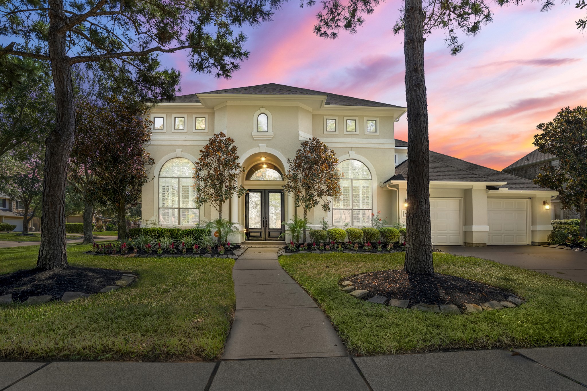 8115 Salta Verde Point Katy, TX 77494 - Photo 46 of 50 a front view of a house with garden