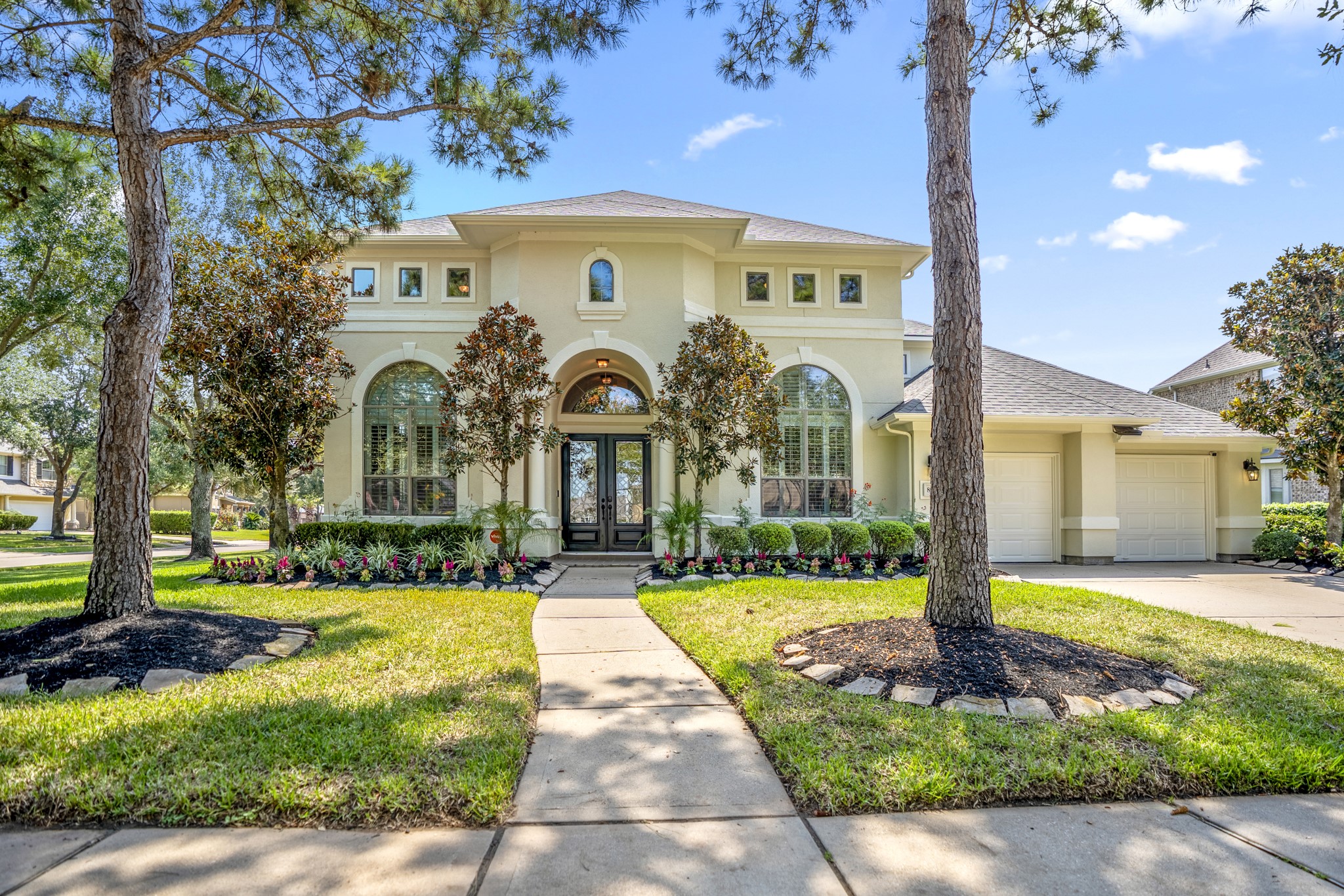 8115 Salta Verde Point Katy, TX 77494 - Photo 47 of 50 a front view of a house with a yard