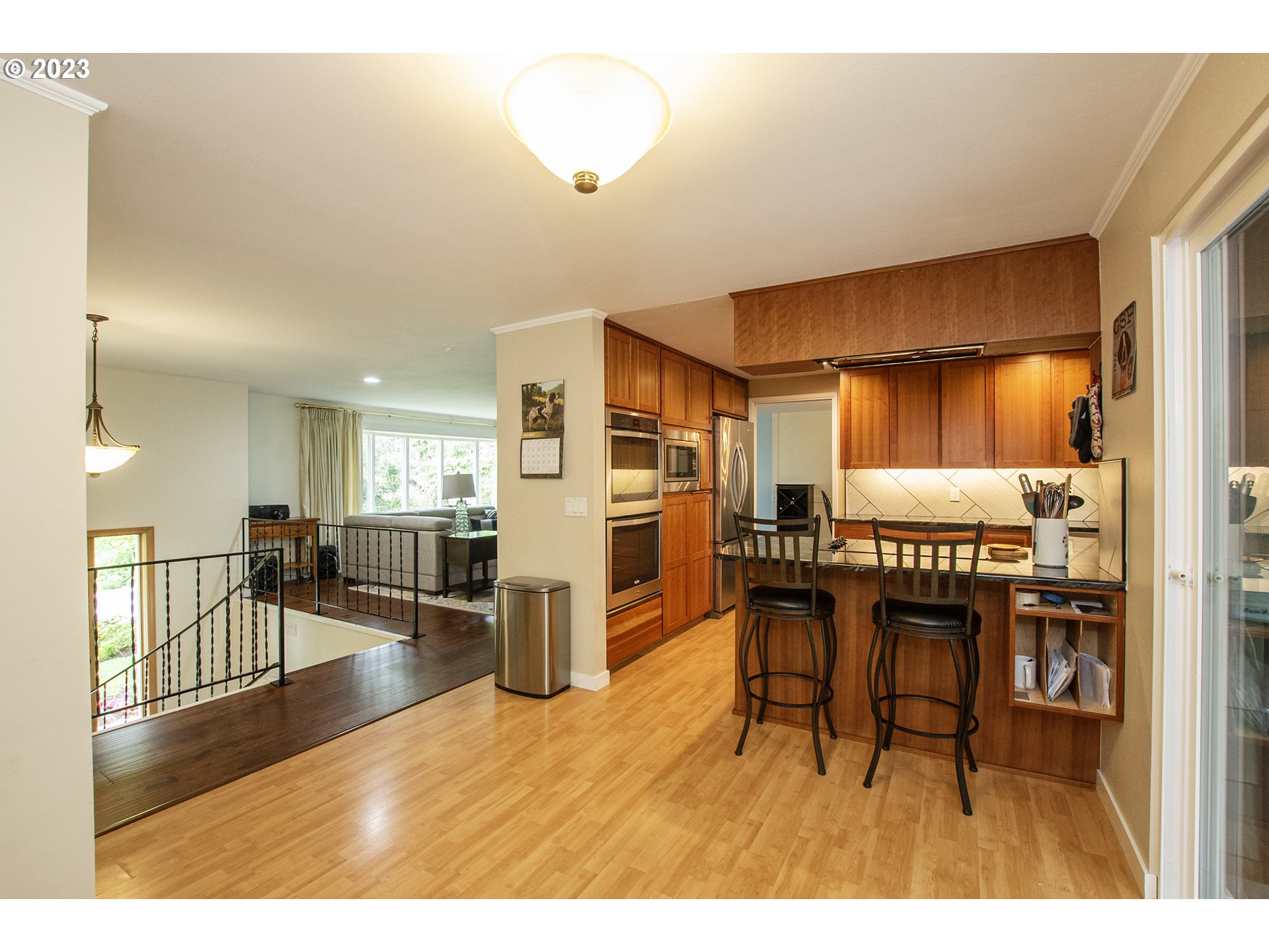 197 Brae Burn Drive Eugene, OR 97405 - Photo 13 of 42 a dining room with furniture and wooden floor