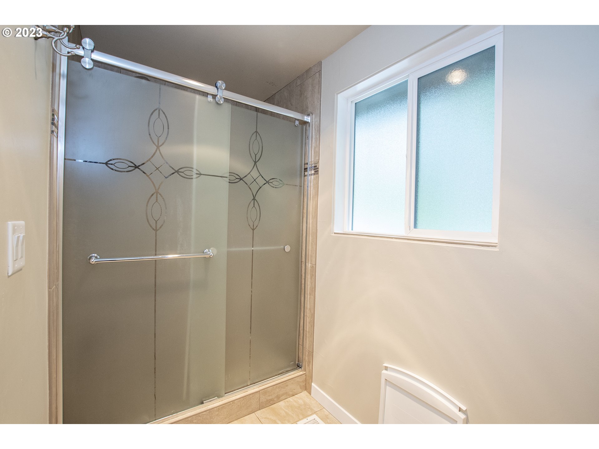 197 Brae Burn Drive Eugene, OR 97405 - Photo 23 of 42 a bathroom with a shower and a sink