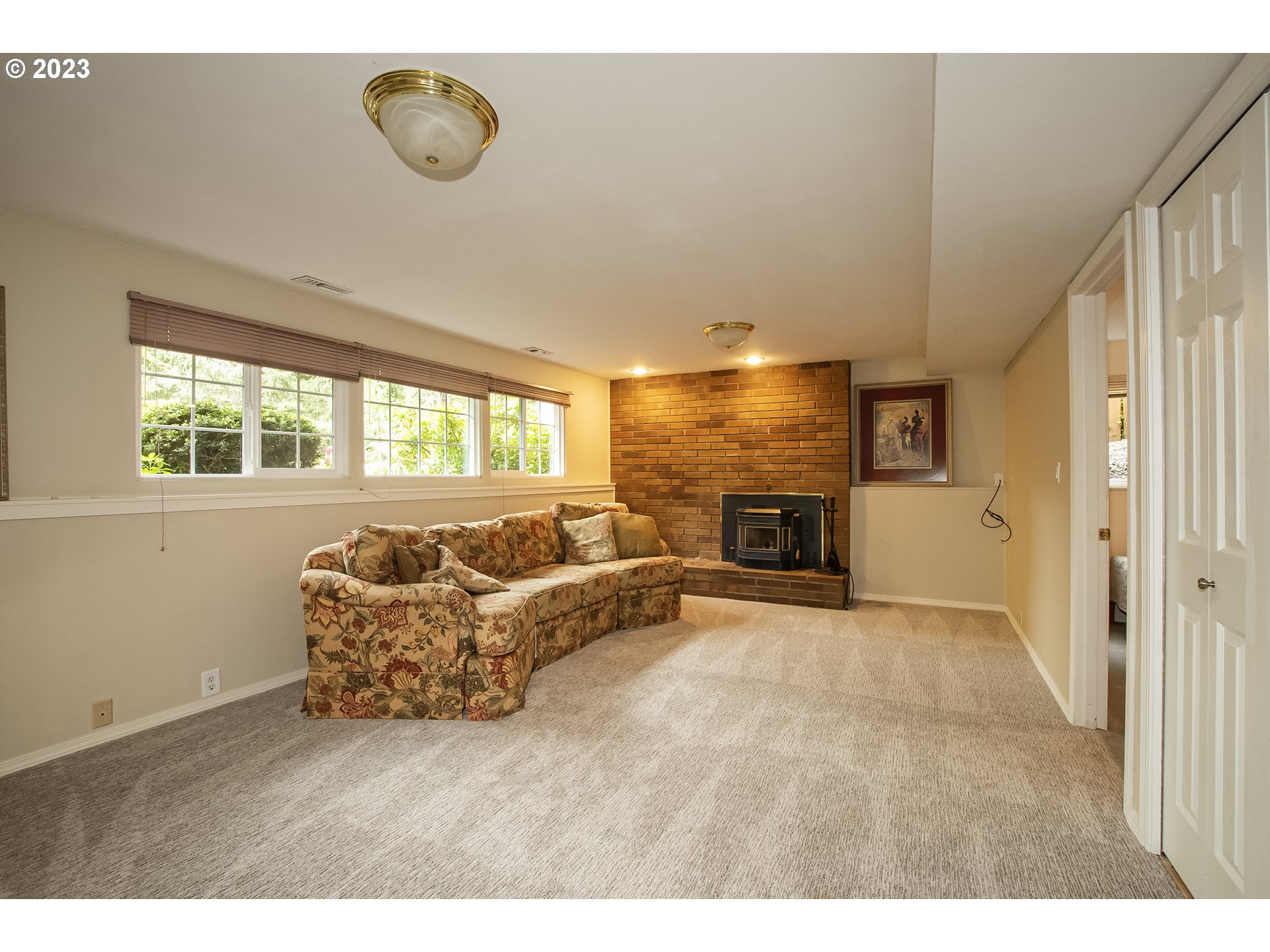 197 Brae Burn Drive Eugene, OR 97405 - Photo 27 of 42 a living room with furniture window and wooden floor