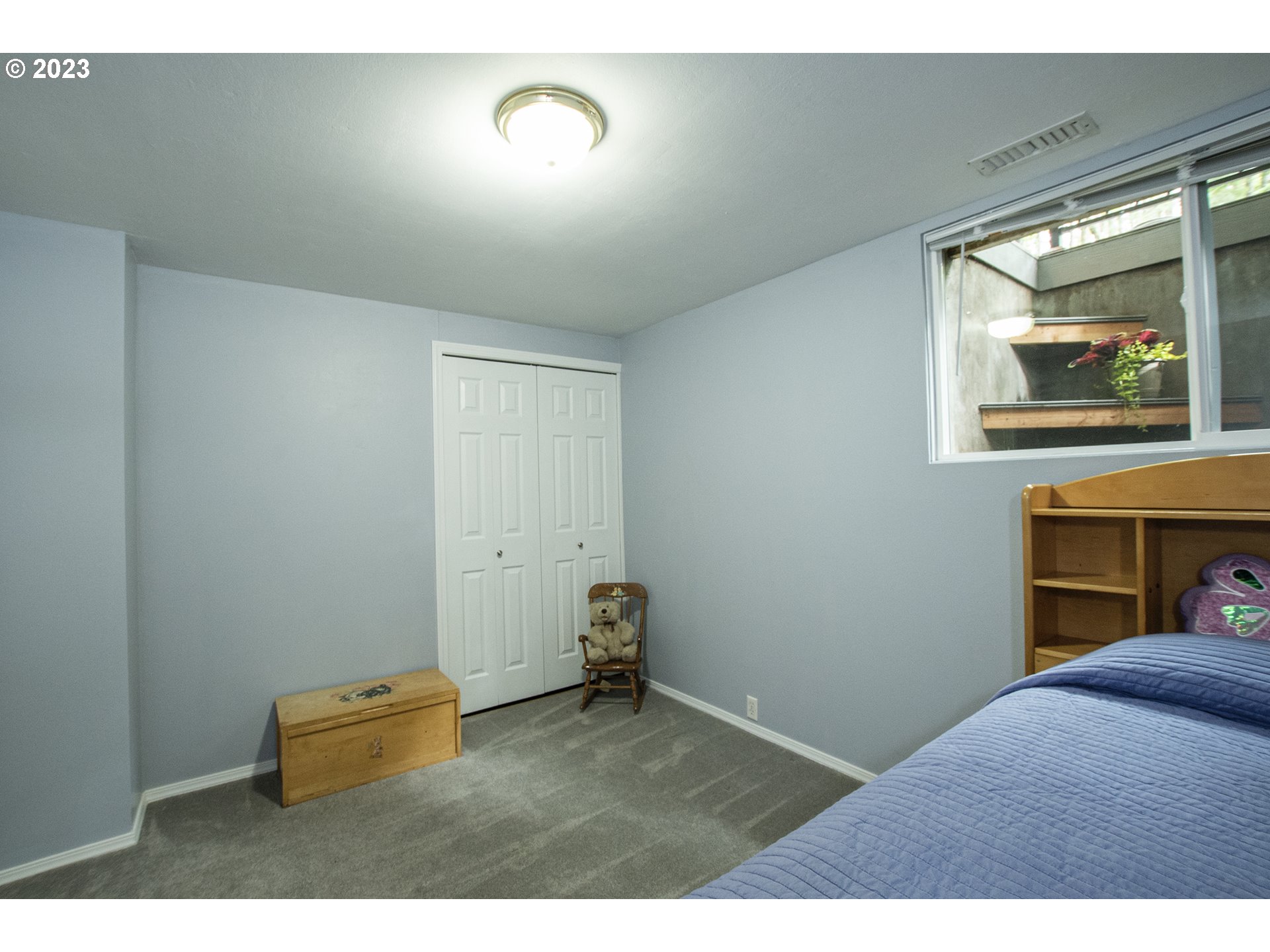 197 Brae Burn Drive Eugene, OR 97405 - Photo 31 of 42 a room with a bed and a painting on the wall