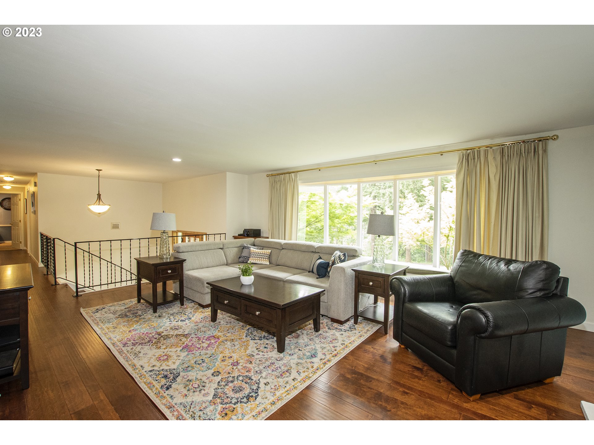 197 Brae Burn Drive Eugene, OR 97405 - Photo 7 of 42 a living room with lots of furniture and a large window