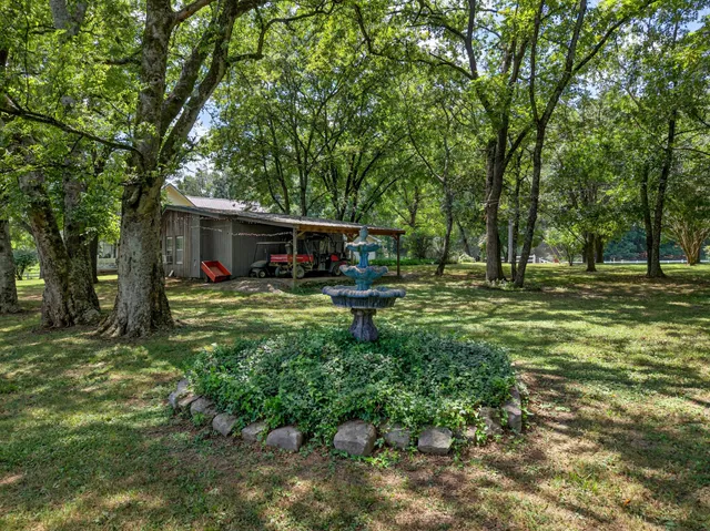 a bedroom with two beds and a couch