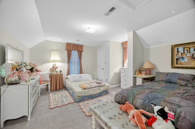 a kitchen with stainless steel appliances granite countertop a refrigerator a stove a sink and dishwasher