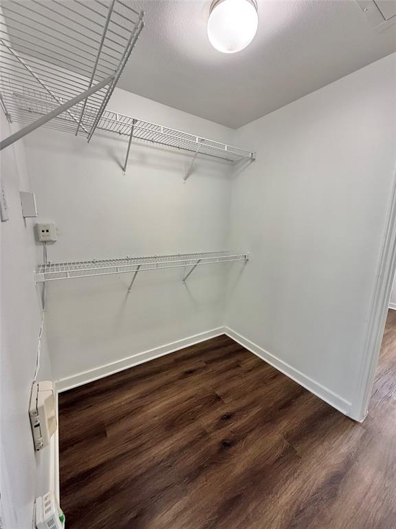 6740 Windhaven Parkway, Unit 5907 The Colony, TX 75056 - Photo 14 of 20 a view of a room with wooden floor