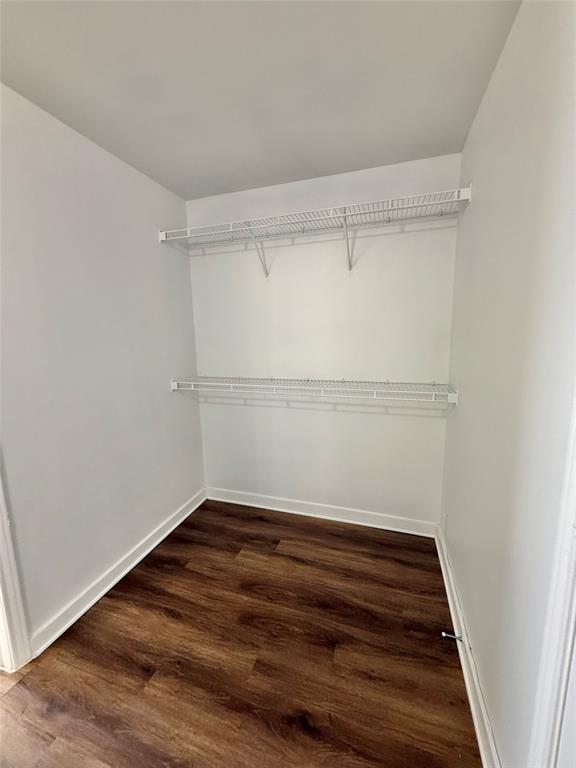 6740 Windhaven Parkway, Unit 5907 The Colony, TX 75056 - Photo 15 of 20 a view of a room with wooden floor