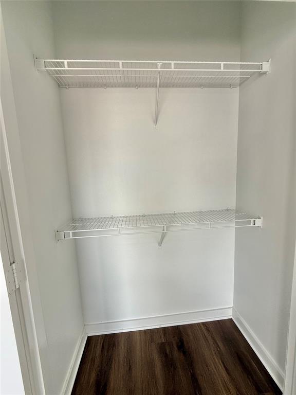 6740 Windhaven Parkway, Unit 5907 The Colony, TX 75056 - Photo 8 of 20 a view of a room with shelf on the wall