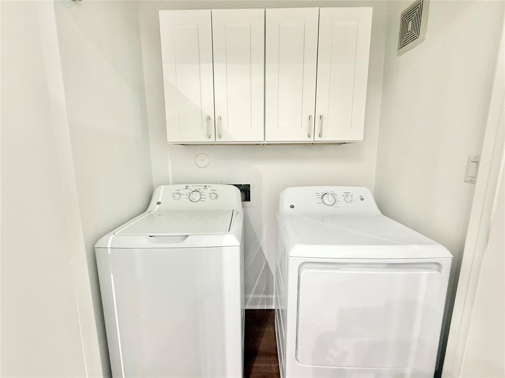 6740 Windhaven Parkway, Unit 5907 The Colony, TX 75056 - Photo 10 of 20 a utility room with dryer and washer